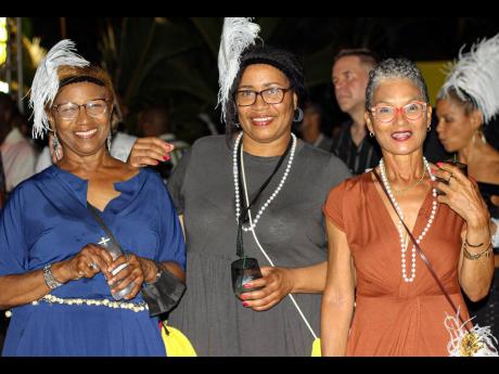 From left: Violet Wade, Resha Henry and Carol Samuels put their work worries away and headed to the Hope Zoo for Bacchanal Premium for a mid-week ladies night out. 