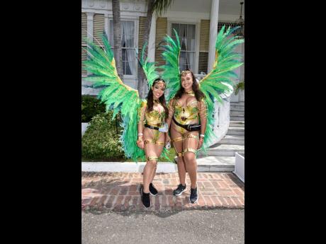 Carnival first-timer Justine Isaacs (left) and Amanda Rickman came to Devon House ready to hit the road with carnival band Xodus.