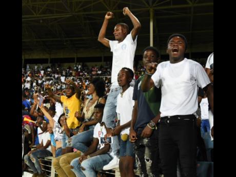 Jubilant fans at Sabina Park during the Jamaica Premier League football finals between eventual winners Harbour View and Dunbeholden at Sabina Park.