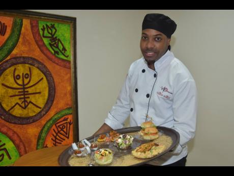 VIP Attractions sous-chef Kevaun Lindsay shows off a range of finger foods.