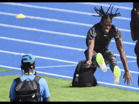 Defending World champion in the men's long jump, Tajay Gayle, leaps during a training session held at the Lane Community College in Oregon, United States, on Wednesday. Gayle, who sustained an injury in the national trials, is awaiting the decision of his 