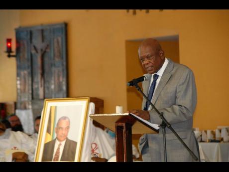 Attorney-at-law Clayton Morgan reflects on the life on his late colleague and mentor, Francis Tulloch, during the thanksgiving service.