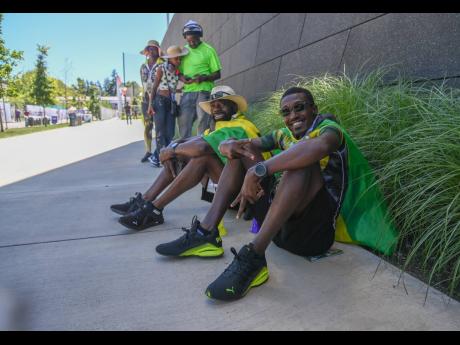 Jamaicans Donovon Henry (left, sitting) and Oystian Sinclair (right), both residents of the United States, at their first World Athletics Championships.