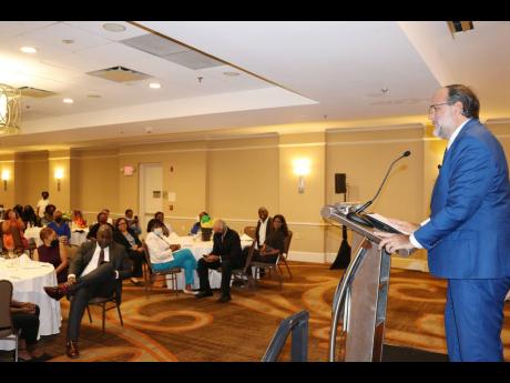 Golding addresses the forum put on by the Caribbean Research and Policy Centre in Silver Spring, Maryland. 