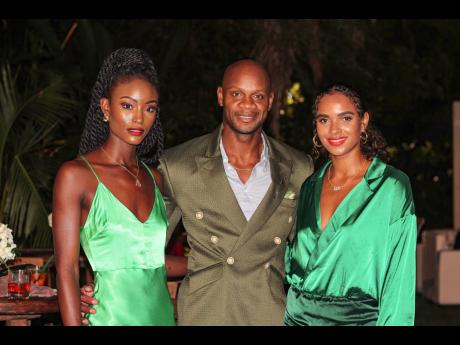 Jamaican Olympian and former 100 metre world record holder Asafa Powell (centre) told us the green looks while patriotic were not planned. But we love how this trio, inclusive of Pulse model Alicia Burke (left) and Alyshia Miller Powell looks complemented 