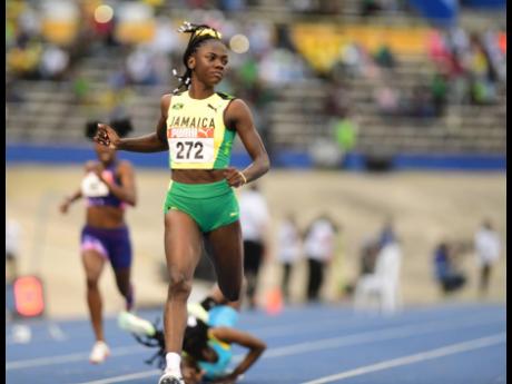 
Brianna Lyston cruises to girls’ Under-20 200-metre title at the 49th staging of the Carifta Games at the National Stadium on April 18.