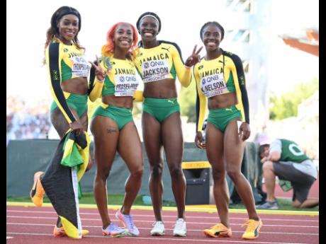 
From left: Jamaica’s Elaine Thompson Herah, Shelly-Ann Fraser Pryce, Shericka Jackson and Kemba Nelson celebrate a silver medal in the women’s 4x100-metre relay on day nine of the World Athletics Championships at the Hayward Field in Eugene, Oregon ye