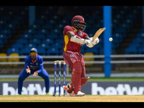 
West Indies’ Kyle Mayers plays a square drive for four during the first One-Day International between the West Indies and India at Queen’s Park Oval, Port-of-Spain, Trinidad and Tobago, on Friday.