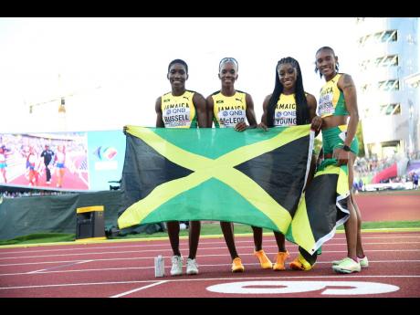 Members of Jamaica’s women’s 4x400 metres relay team who won silver medals on the last day of the 2022 World Athletics Championships in Eugene, Oregon.  Fromn left: Janieve Russell, Stephenie-Ann McPherson, Charokee Young and Candice McLeod.