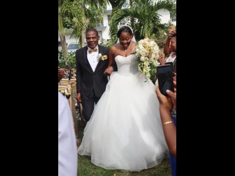  Father of the bride Sylvester Fairclough was happy to escort his princess up the aisle.