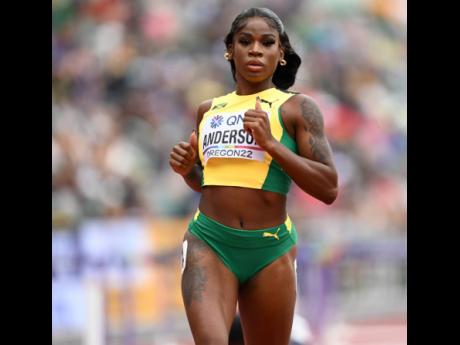 left: Jamaica’s Britany Anderson competing in the women’s 100m hurdles heats of the World Athletic Championships at Hayward Field in Oregon, United States, on Saturday, July 23. 