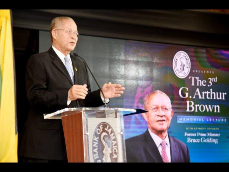 Former Prime Minister Bruce Golding delivering the keynote speech at the G. Arthur Brown Memorial Lecture at the Bank of Jamaica Auditorium in Kingston on Thursday.