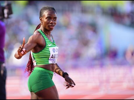 Nigeria’s Tobi Amusan moments after breaking the women’s 100-metre hurdles world record in the semi-finals of the event at the World Athletics Championships in Eugene, Oregon on July 24. Amusan clocked 12.12 seconds. 