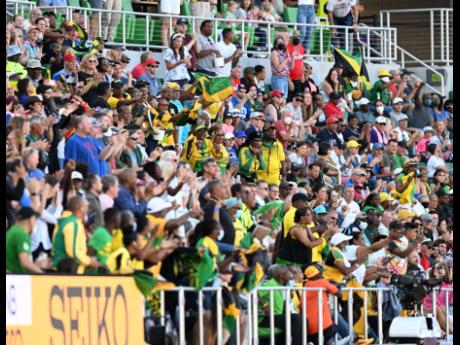 Jamaican supporters cheer from the stands  at the World Athletics Championships at Hayward Field in Oregon, United States on Friday, July 22. 