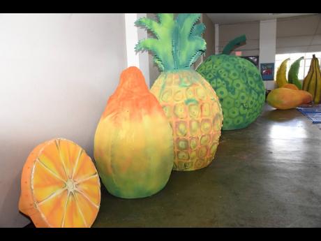 Artworks finished and ready inside the National Arena for the  Emancipation Day Float Parade for Monday, August 1.