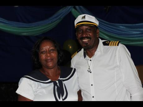 Jasmin Crook (left) understood the assignment as she dressed the part in her sailor’s dress to celebrate her former schoolmate Michael Nicholson’s 60th birthday.