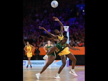 
South Africa’s Bongwie Msomi fights for the ball with Sunshine Girls’ Latanya Amoy Wilson, during a Netball Pool A match on day two of the Birmingham 2022 Commonwealth Games at NEC Arena on Saturday.