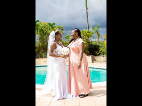 There’s nothing like a mother’s love. The bride shares a priceless moment with her mother, Julia Harze. 