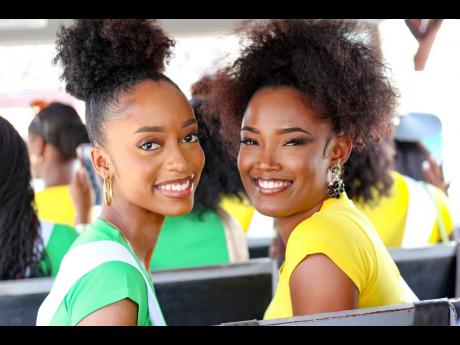 Not even the sun could outshine the smiles of Miss Universe Jamaica East Zara Holmes (left) and Miss Universe Jamaica Central Shantana Pitterman.
