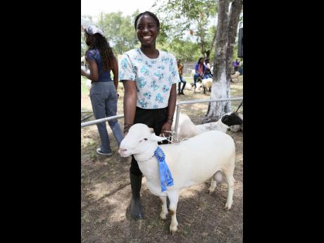 Akelah Clarke, a student of Foga Road High School, with one of her winning entries at the 68th staging of the Denbigh Agricultural, Industrial and Food Show in May Pen, Clarendon.