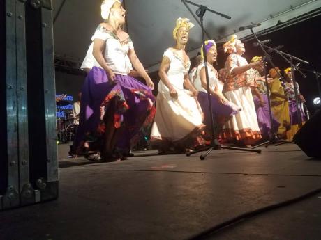 The Carifolk Singers thrilling the audience with their moves and voices at the Emancipation jubilee vigil at the Seville Heritage Park on Sunday night.