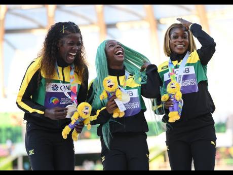 Jamaica secured a 1-2-3 sweep in the women’s 100m sprint at the 2022 World Championships, with (from left ) Shericka Jackson securing silver; World Champion Shelly-Ann Fraser-Pryce, gold, and Elaine Thompson-Herah, bronze. 