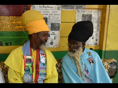 Rastafarian Priests Christopher Morant (left) and Trevor Stewart talk about their opposition to the celebration of Jamaica’s Independence.