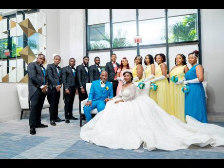 The royal Mr and Mrs Jacobs hold nuptial court with their supportive bridal party..