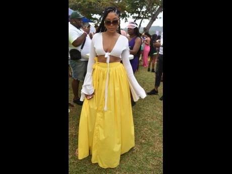 Chrissy Edwards chose a flowy yellow maxi skirt for the occasion. 