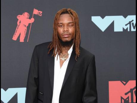 Fetty Wap, whose real name is Willie Maxwell, has been jailed after prosecutors say he threatened to kill a man during a FaceTime call in 2021, violating the terms of his pretrial release in a pending federal drug conspiracy case. 