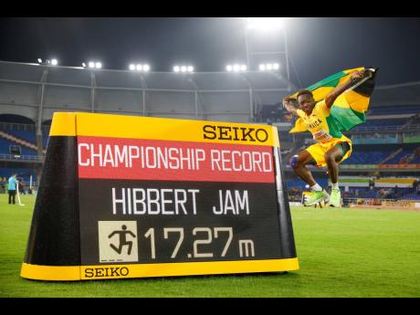 Jaydon Hibbert celebrates the championship record he set in the men’s triple jump at the World Under-20 Championships in Cali, Colombia, on Friday.