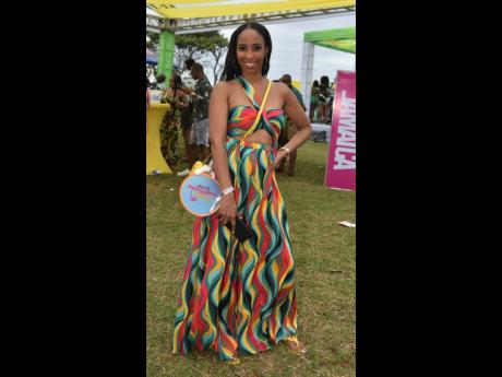 Alecia Getfield showed cultural pride at Daybreak in a red, green and golden yellow coloured maxi dress.