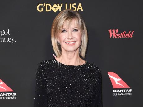 Actress and singer Olivia Newton-John attends the 2018 G’Day USA Los Angeles Gala in Los Angeles in 2018. Newton-John, a longtime resident of Australia whose sales topped 100 million albums, died Monday at her southern California ranch.