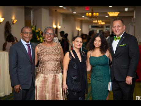 From left: Courtney Campbell, Group President & CEO, VM Group,  his wife, Pauline; Tanya Mair, wife of Jamaican Consul General, Oliver Mair, their daughter, Serena, and Oliver Mair celebrate Jamaica 60 in Florida.