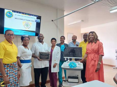 Representatives of the Atlanta Jamaican Association, Inc, (AJA), St Ann and St Mary Rep Yuh Parish team with members of the maternity ward at the St Ann’s Bay Regional Hospital at the handover of medical equipment. 