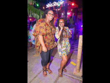Oris Shaw (left) and Amimata Either couldn’t contain their excitement for our lens when they heard that dancehall artiste Jahvillani would take the stage next.