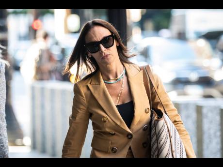 R. Kelly’s defense attorney, Jennifer Bonjean, walks into the Dirksen Federal Courthouse in Chicago on Monday, August 15.