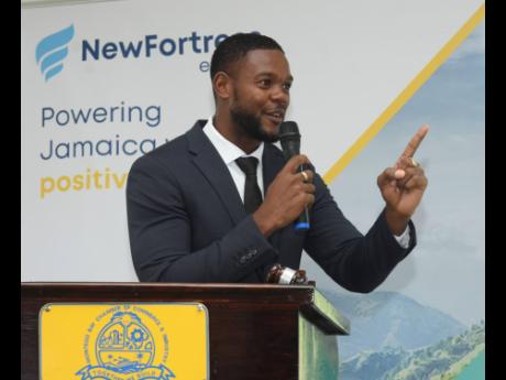 Montego Bay’s Deputy Mayor Richard Vernon addresses the New Fortress Energy Fuondation’s Back-to-School Fair on August 11.