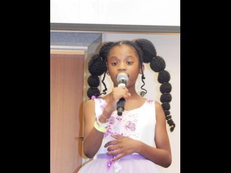 Jazmin Headley, a nine-year-old Canadian singer, writer and actress of Jamaican parentage makes her debut on the Jamaica Poetry Festival stage.