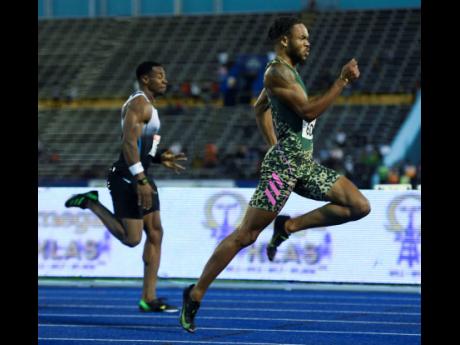 Andrew Hudson (right), seen here on his way to winning the national 200-metre title will be debuting for Jamaica at the Nacac Senior Championships in Freeport, Barbados. Also pictured is Yohan Blake.