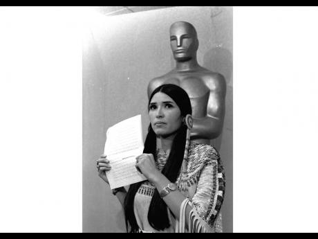 Sacheen Littlefeather appears at the Academy Awards ceremony to announce that Marlon Brando was declining his Oscar as best actor for his role in ‘The Godfather’ on March 27, 1973. The move was meant to protest Hollywood’s treatment of American India