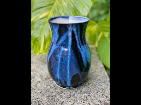A flower vase made by Sally Roper for Yabba Pottery.