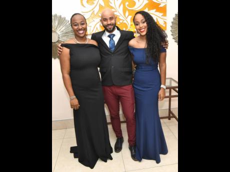 Out of scrubs and ready for the evening were (from left) Dr Autrene Buchanan-Waite, Dr Stephen Alexander, and Dr Mindi Fitz-Henley.