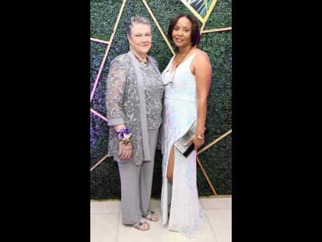 Professor Denise Eldemire-Shearer (left) and Annazika Watkins both opted for shimmery looks.