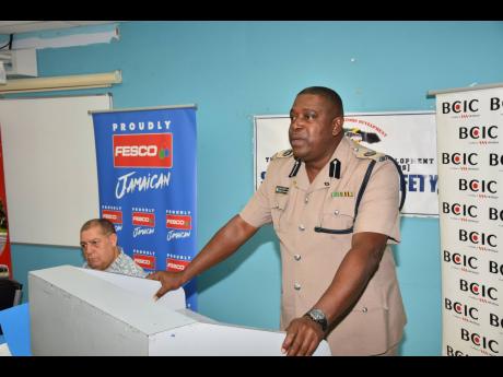 Head of the Public Safety and Traffic Enforcement Branch (PSTEB) of the Jamaica Constabulary Force, Assistant Commissioner of Police Gary McKenzie, addresses the recent presentation ceremony for the Blue Ribbon First Responders Training Programme at the Un