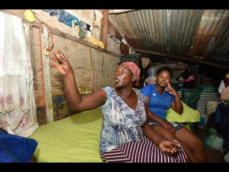 Dezreen Miller and her daughter, Anita Stephenson, speak with The Gleaner about their living conditions in Olympic Gardens, St Andrew.