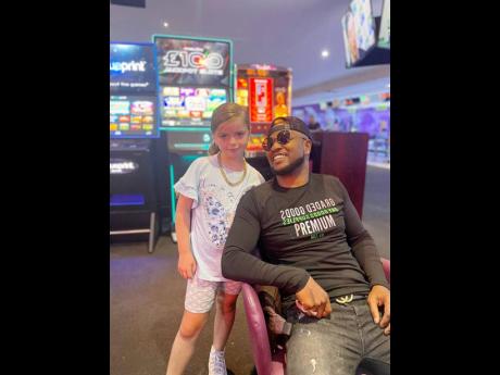 Serani hangs out with seven-year-old Lottie Tute, who he welcomed on the stage during his performance last Sunday at Manchester Caribbean Carnival at Alexandra Park. He was encouraged by the audience as the little girl sang his hit single ‘No Games’ wo