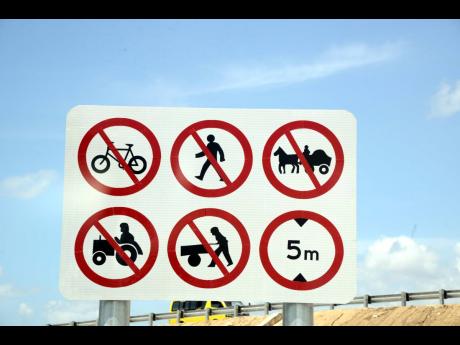 The warning signs are large, clear and strategically placed along the highways that meander across the island: No pedestrians. No cyclists.