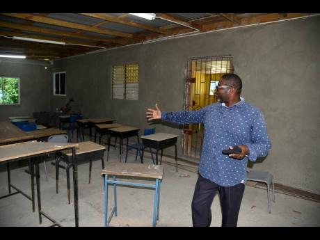 Norman Rose, Seaforth High’s sixth-form programme coordinator, shows a newly constructed classroom for students exiting grade 11 without sufficient Caribbean Secondary Education Certificate passes.