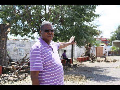 Major Paul Scott, principal of May Pen Primary, points to work being done at the Clarendon-based school as it prepares for reopening on September 5.